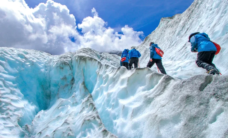 Expedition travel - luxury travel trend 2024. Here glacier expedition. 